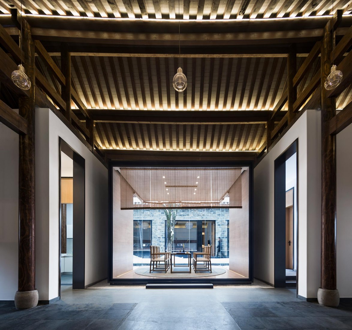 Glass tea house. Jiangshan Fishing Village by Mix Architecture. Photograph by Hou Bowen