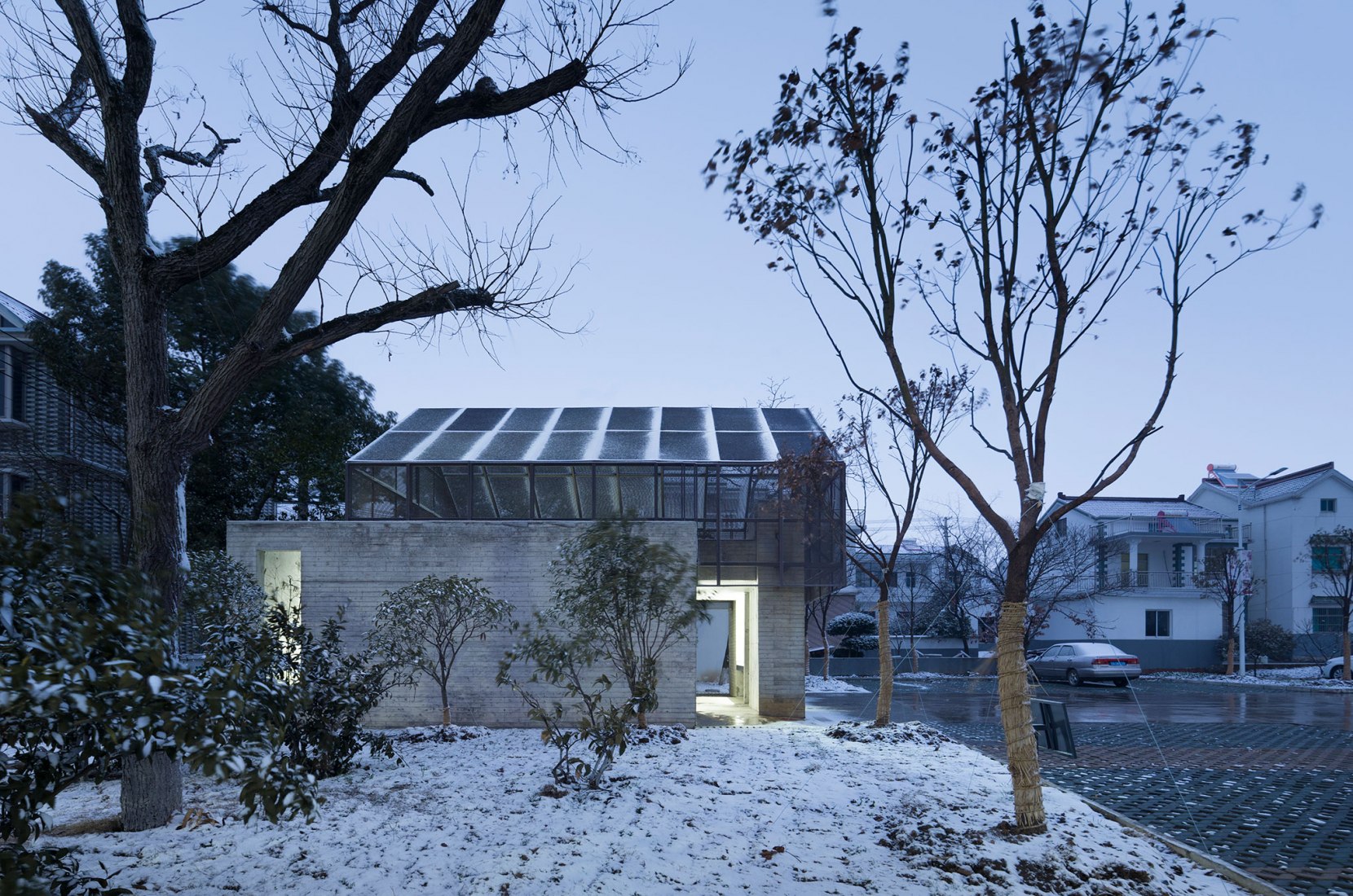 Night view of public toilet. Jiangshan Fishing Village by Mix Architecture. Photograph by Hou Bowen