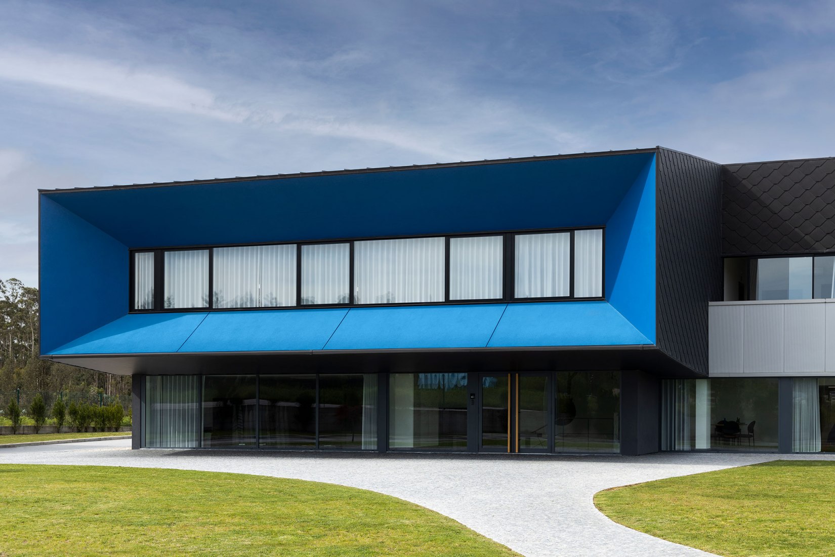 Unidade Industrial Duvalli by 3.14 Arquitectura. Photograph by Ivo Tavares Studio.