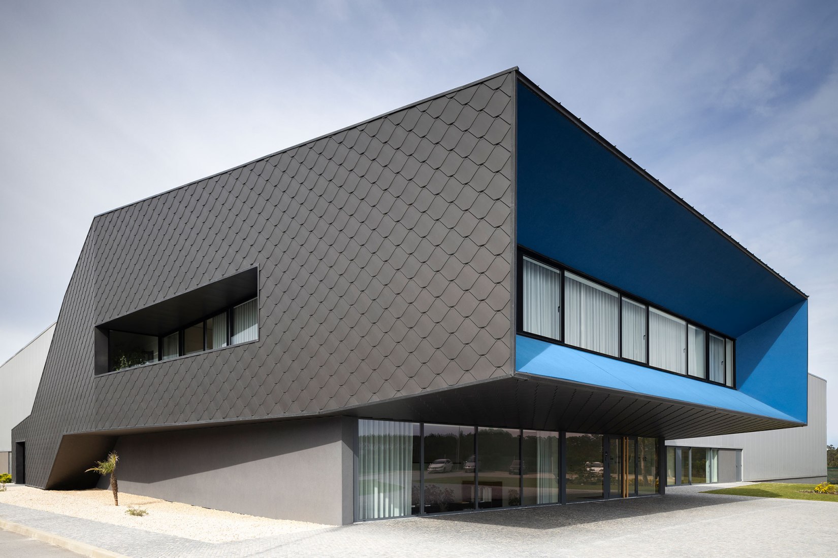 Unidade Industrial Duvalli by 3.14 Arquitectura. Photograph by Ivo Tavares Studio.