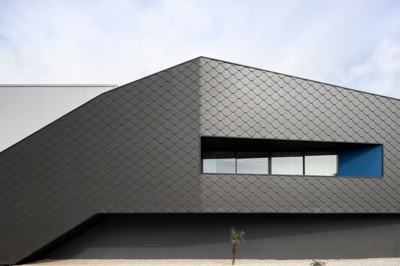 Unidade Industrial Duvalli by 3.14 Arquitectura. Photograph by Ivo Tavares Studio.