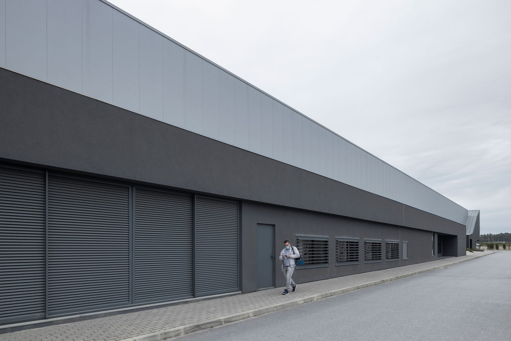 Unidade Industrial Duvalli by 3.14 Arquitectura. Photograph by Ivo Tavares Studio.