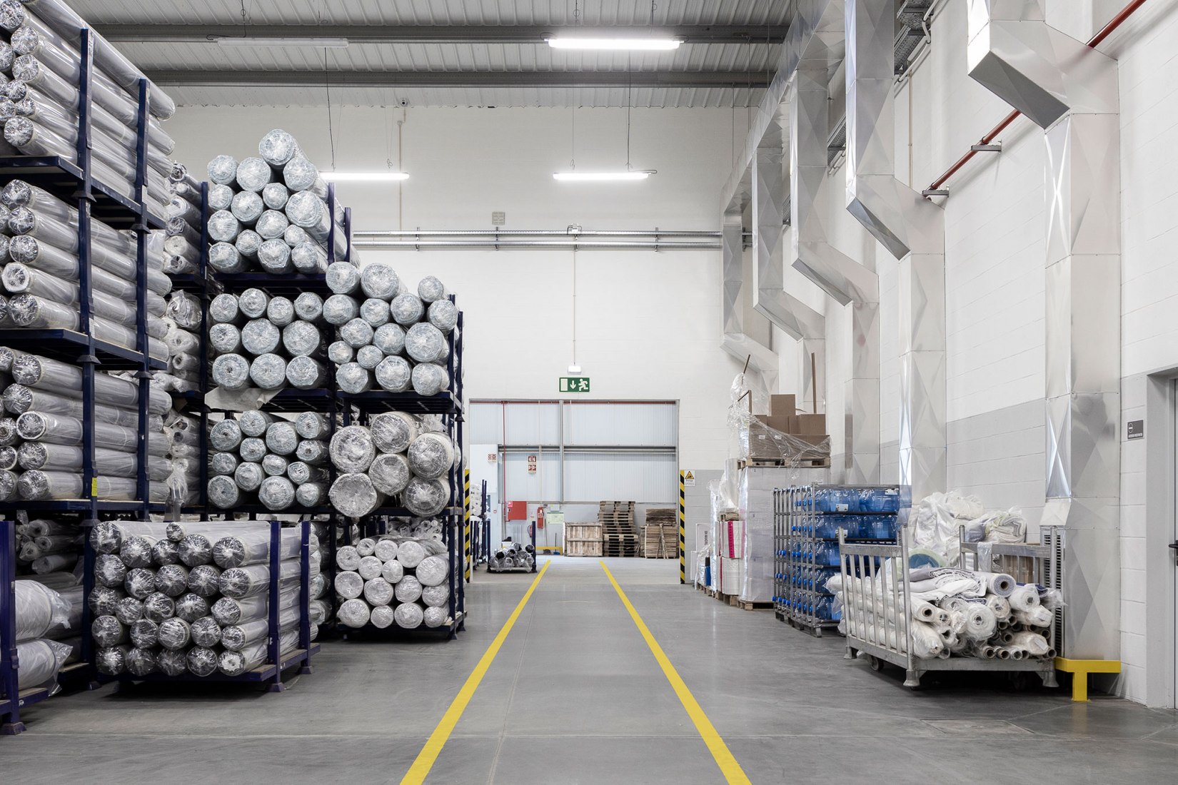 Unidade Industrial Duvalli by 3.14 Arquitectura. Photograph by Ivo Tavares Studio.
