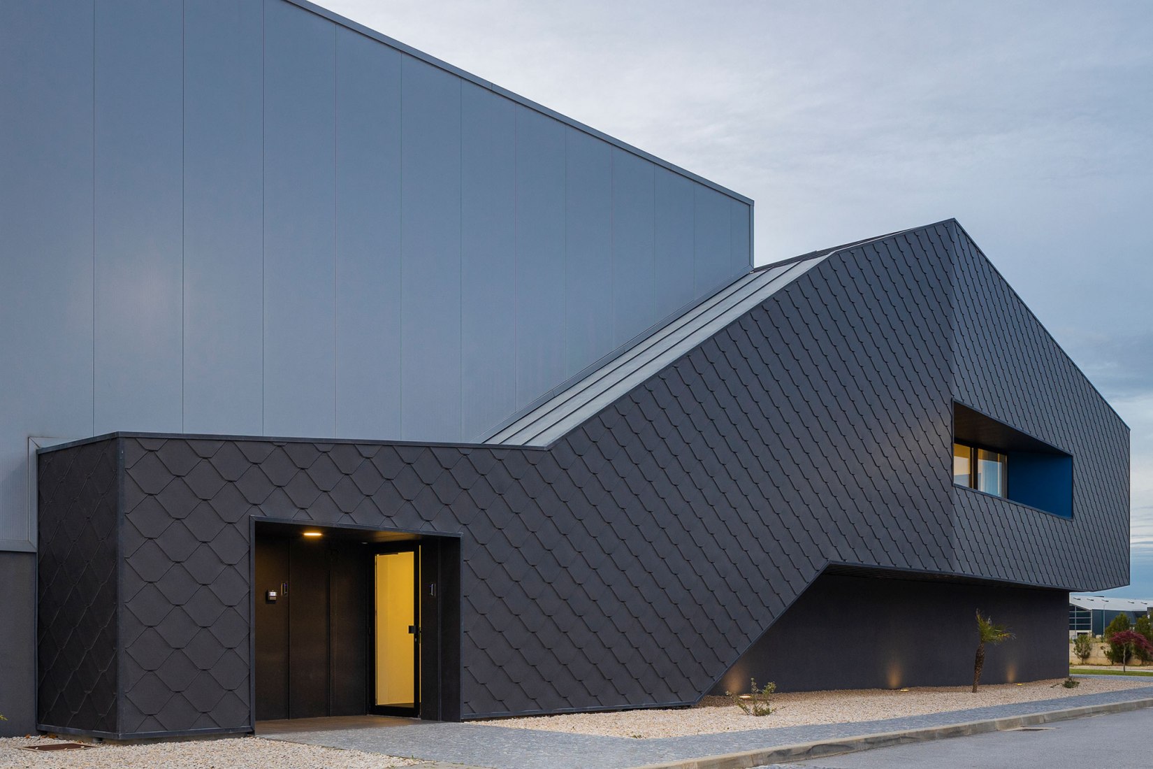 Unidade Industrial Duvalli by 3.14 Arquitectura. Photograph by Ivo Tavares Studio.