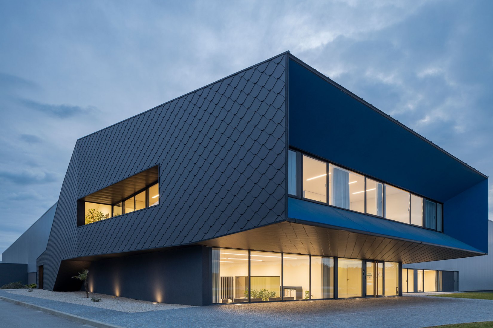 Unidade Industrial Duvalli by 3.14 Arquitectura. Photograph by Ivo Tavares Studio.