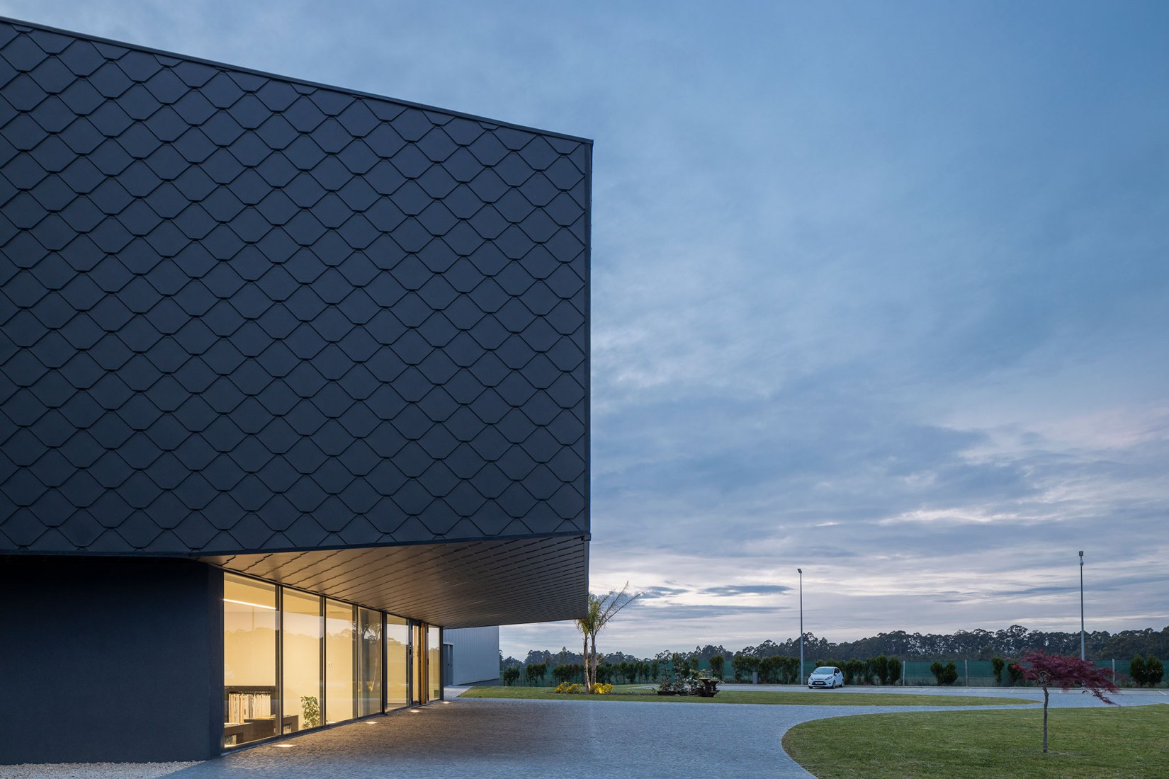 Unidade Industrial Duvalli by 3.14 Arquitectura. Photograph by Ivo Tavares Studio.