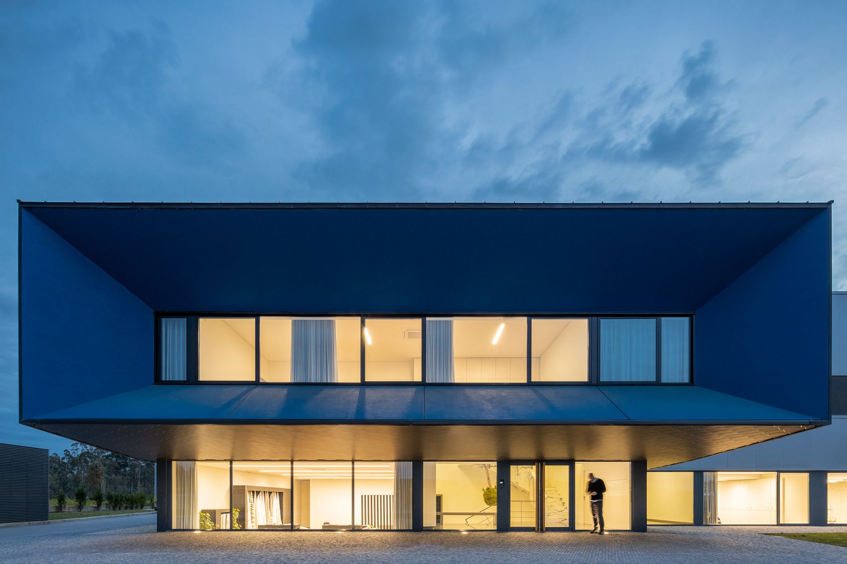 Unidade Industrial Duvalli by 3.14 Arquitectura. Photograph by Ivo Tavares Studio.