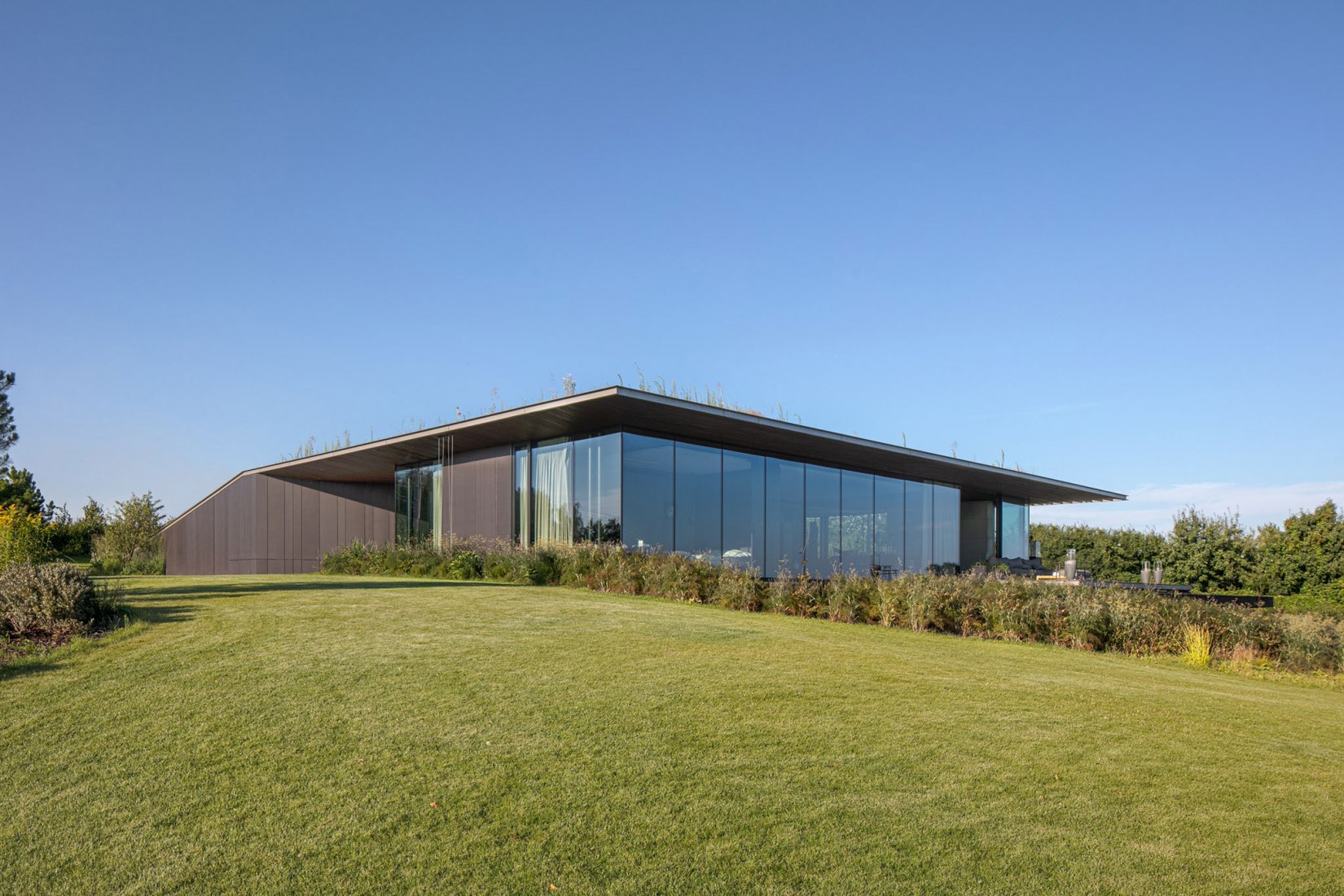 Casa pendiente 35:35 por 77 Studio Architektury. Fotografía por Piotr Krajewski.