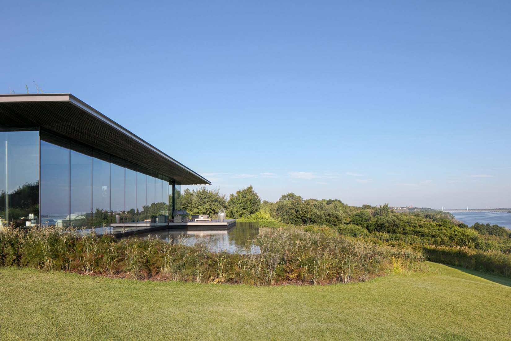 Casa pendiente 35:35 por 77 Studio Architektury. Fotografía por Piotr Krajewski.