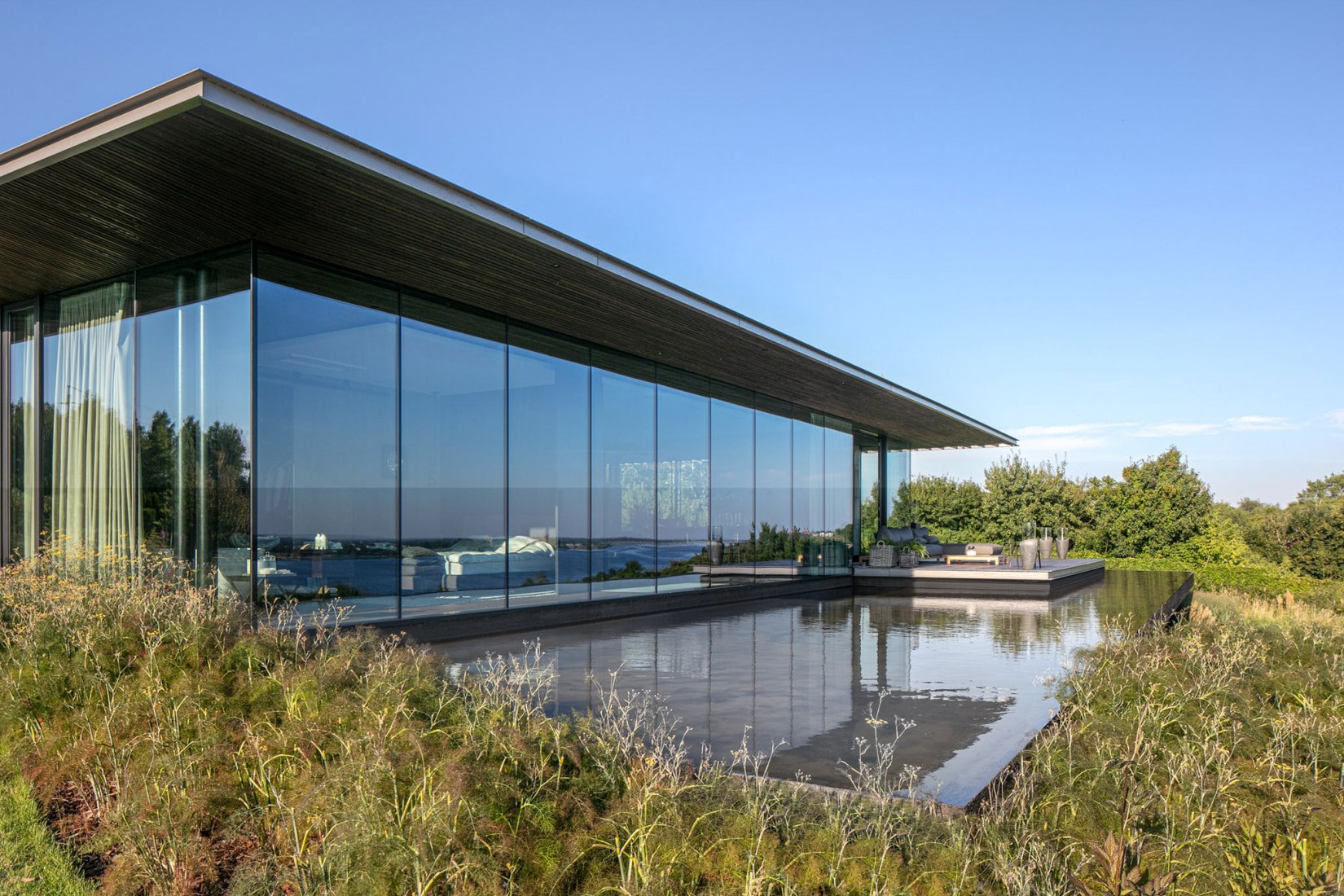 Casa pendiente 35:35 por 77 Studio Architektury. Fotografía por Piotr Krajewski.