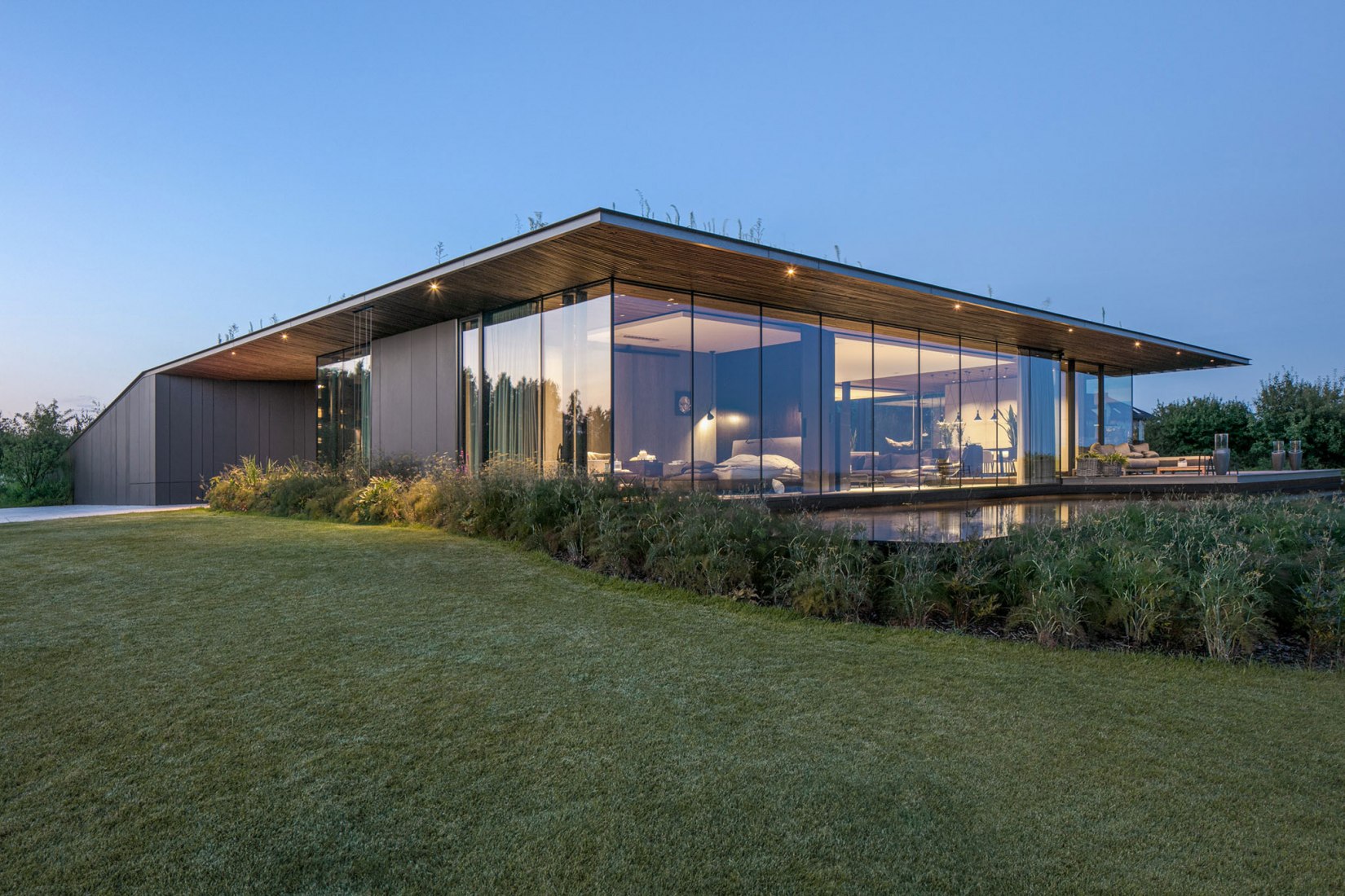 Casa pendiente 35:35 por 77 Studio Architektury. Fotografía por Piotr Krajewski.