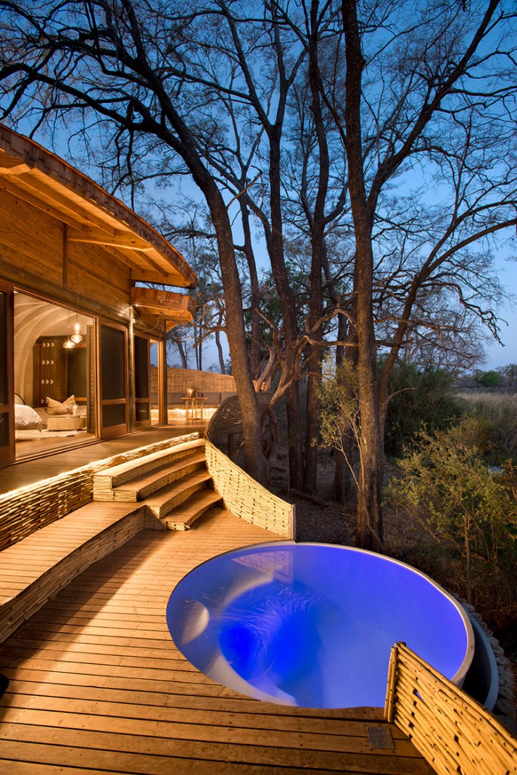 Exterior view of the lodge of the Sandibe Okavango Safari in Botswana, by Nicholas Plewman Architects and Michaelis Boyd Architects. Photography © Dook. 