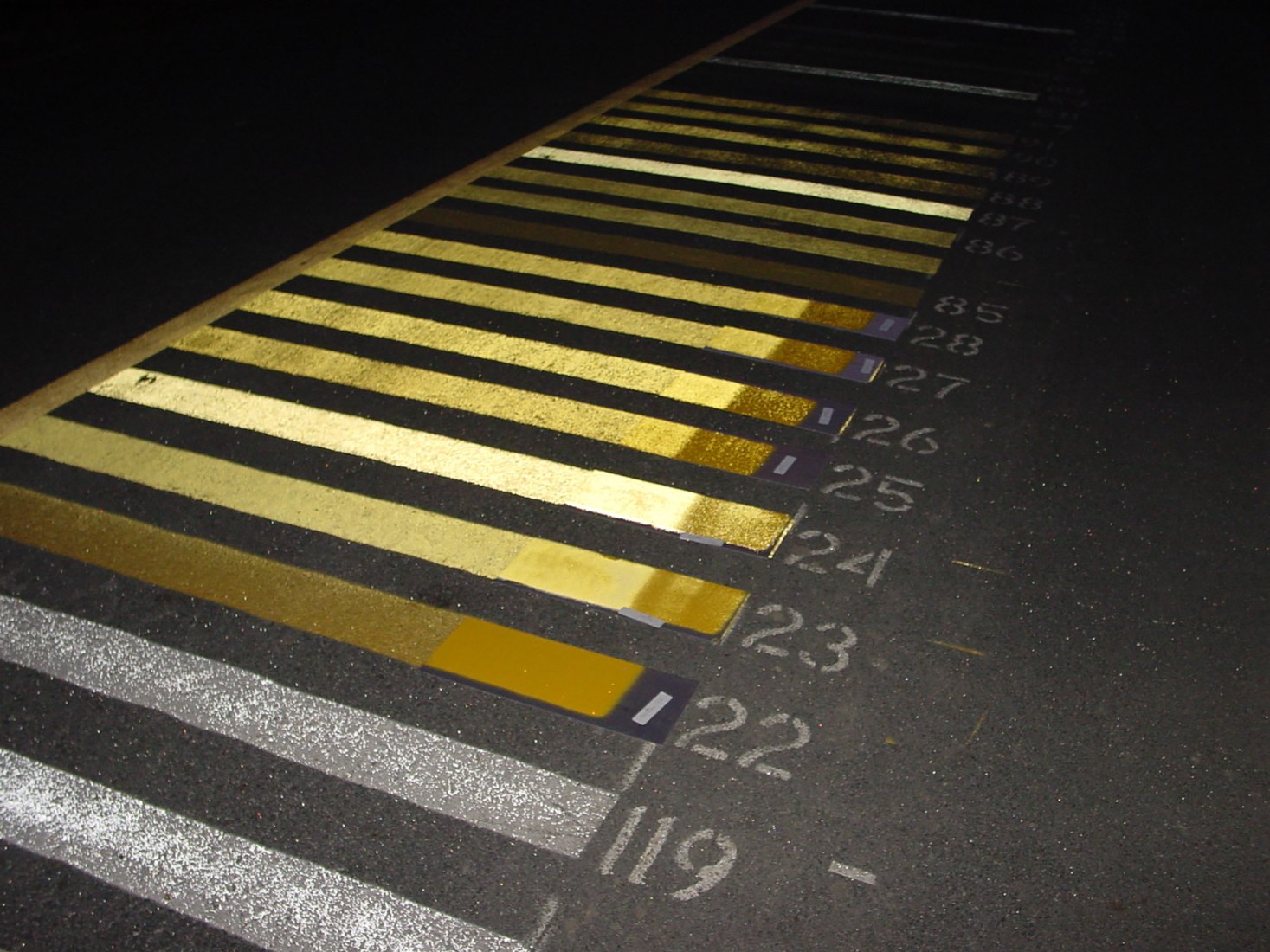 The firm took materials associated with roadway lane striping, high index reflective glass bead traffic coatings