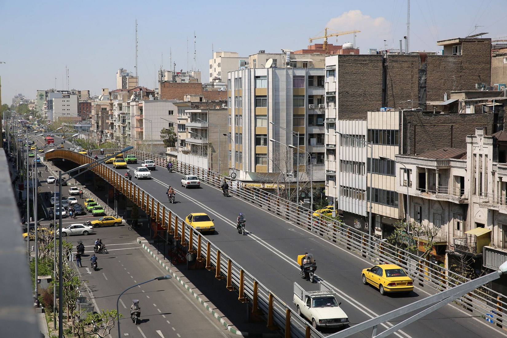 View of the street. Enghelab Street Rehabilitation by Amir Anoushfar, Abdolazim Bahmanyar, Mohadeseh Mirderikvandi. Photograph © Aga Khan Trust for Culture / Barzin Baharlooei. 