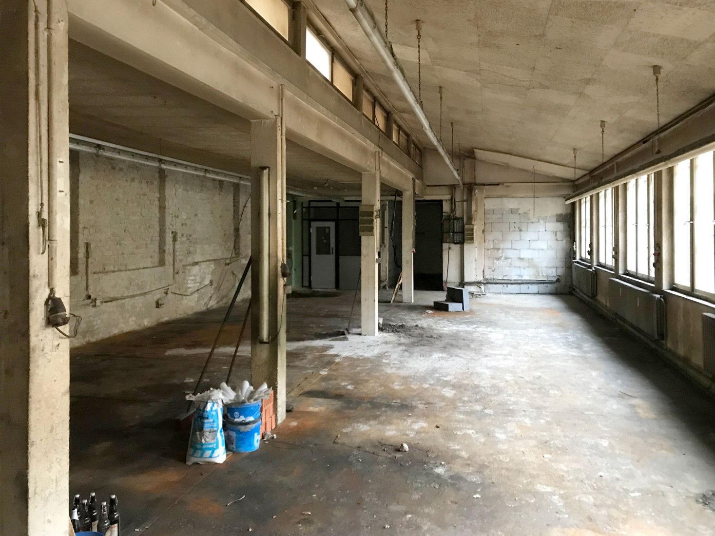 Before. Renovation of an Old Locksmith Shop by ALAS Alarcon Linde Architects. Photograph by Ronald Patrick.