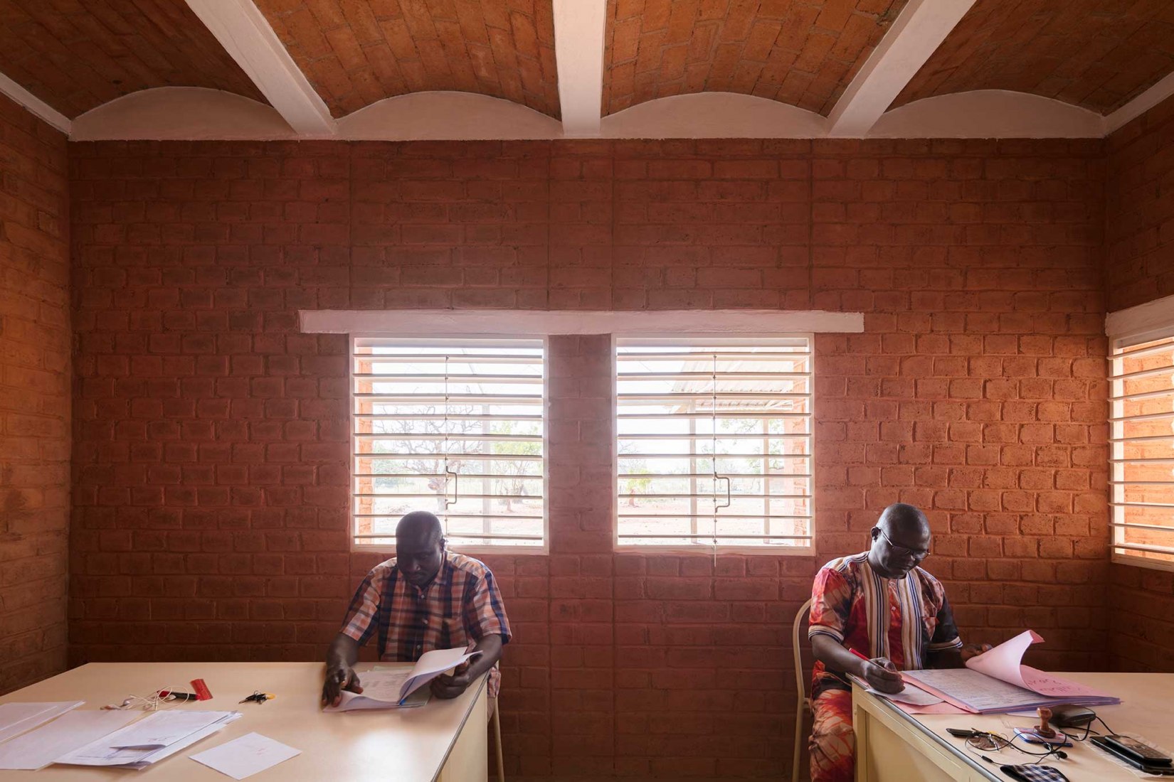 Secondary School and Auxiliary Buildings of Bangre Veenem School Complex by Albertfaus Architecture. Photograph by Milena Villalba