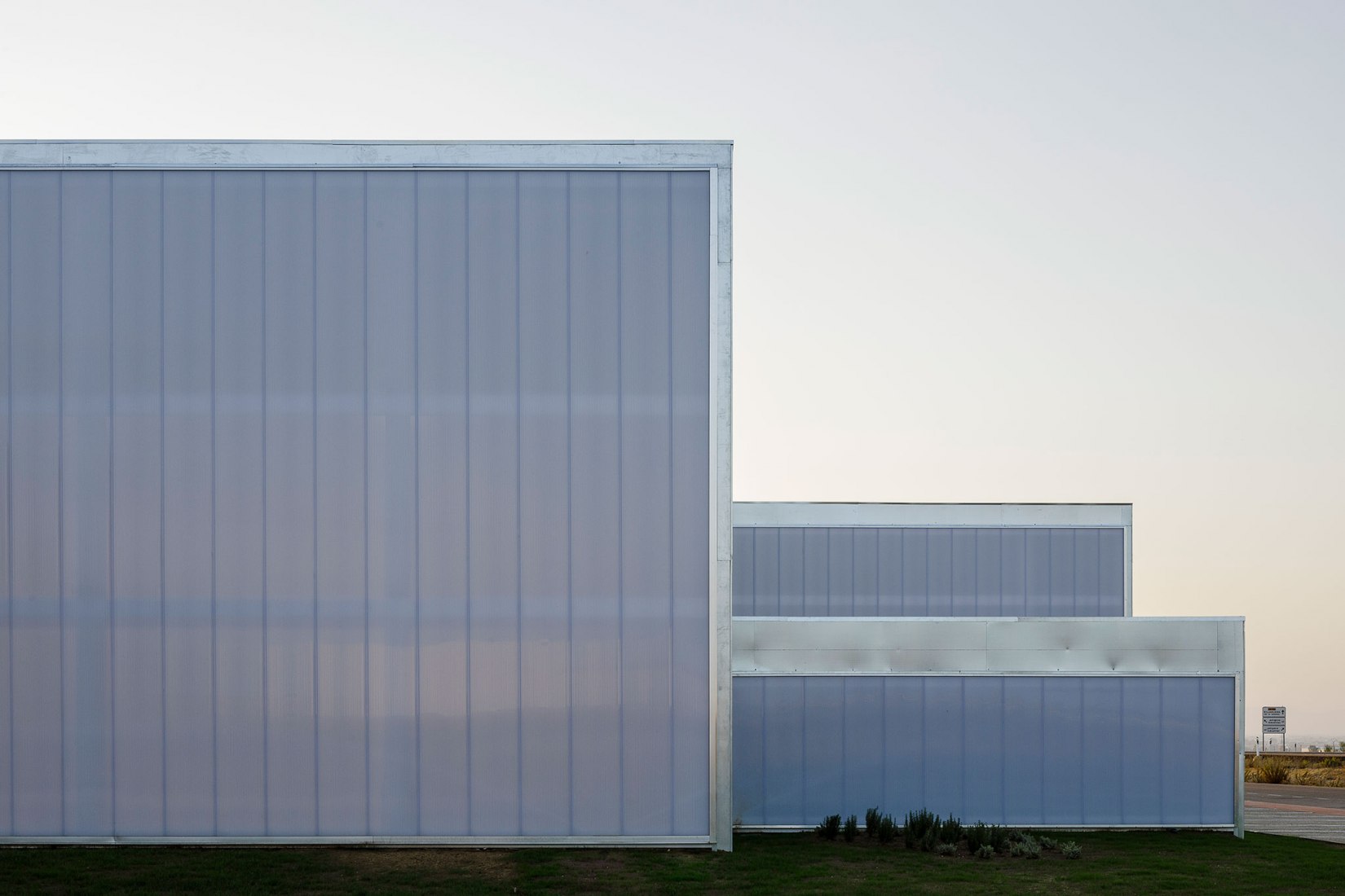 Industrial Building for Brigadas & Promedio Center by Estudio Arquitectura Hago. Photograph by Fernando Alda