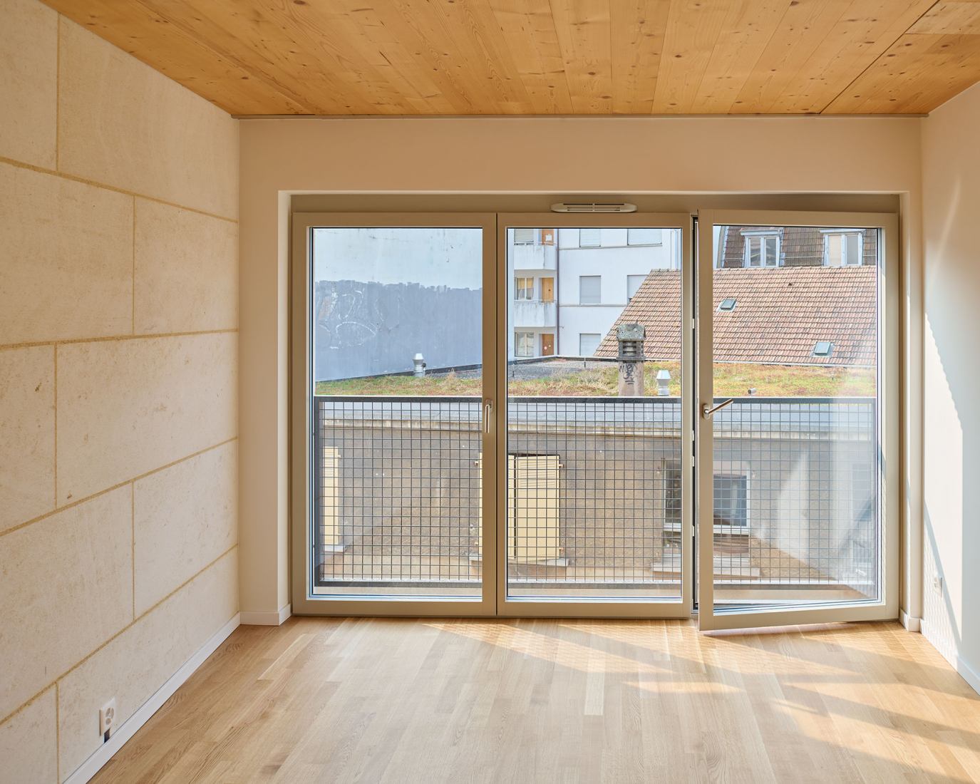 10 viviendas sociales a orillas del Ródano por Atelier Archiplein. Fotografía por Leo Fabrizio.