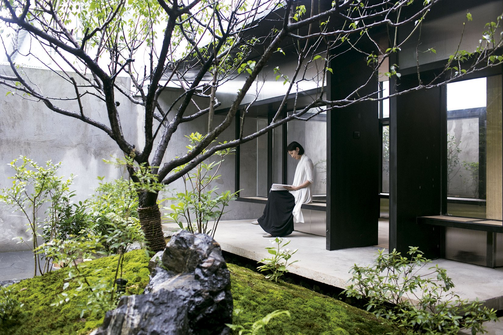 Casa de te en Li Garden por Atelier Deshaus. Fotografía por Tian Fangfang.