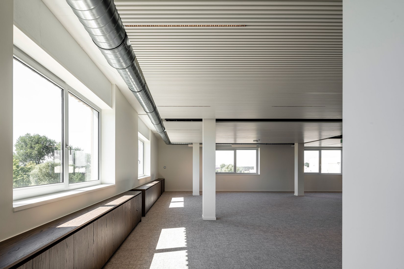 Campus Aquafin por B-architecten. Fotografía por Olmo Peeters.