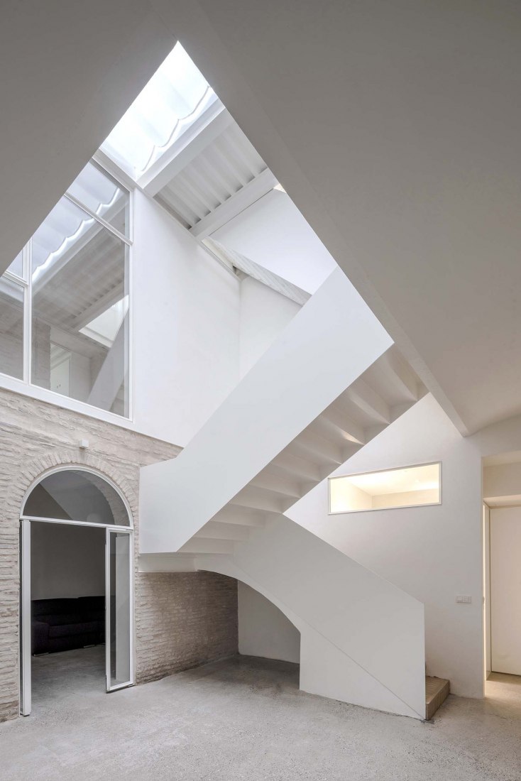 House for a family of musicians by Baum Arquitectura. Photograph by Jesús Granada