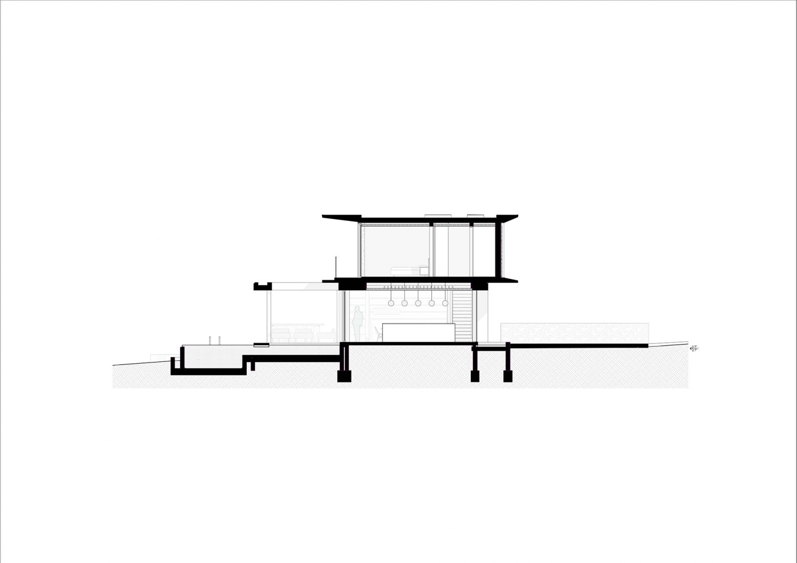 Sección. Casa del Bosque por Bloc Architects.