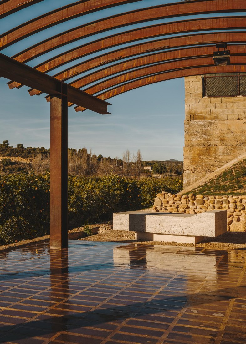 A pergola open to the orchard by Bona Fide Taller. Photograph by Oleh Kardash Horlay.
