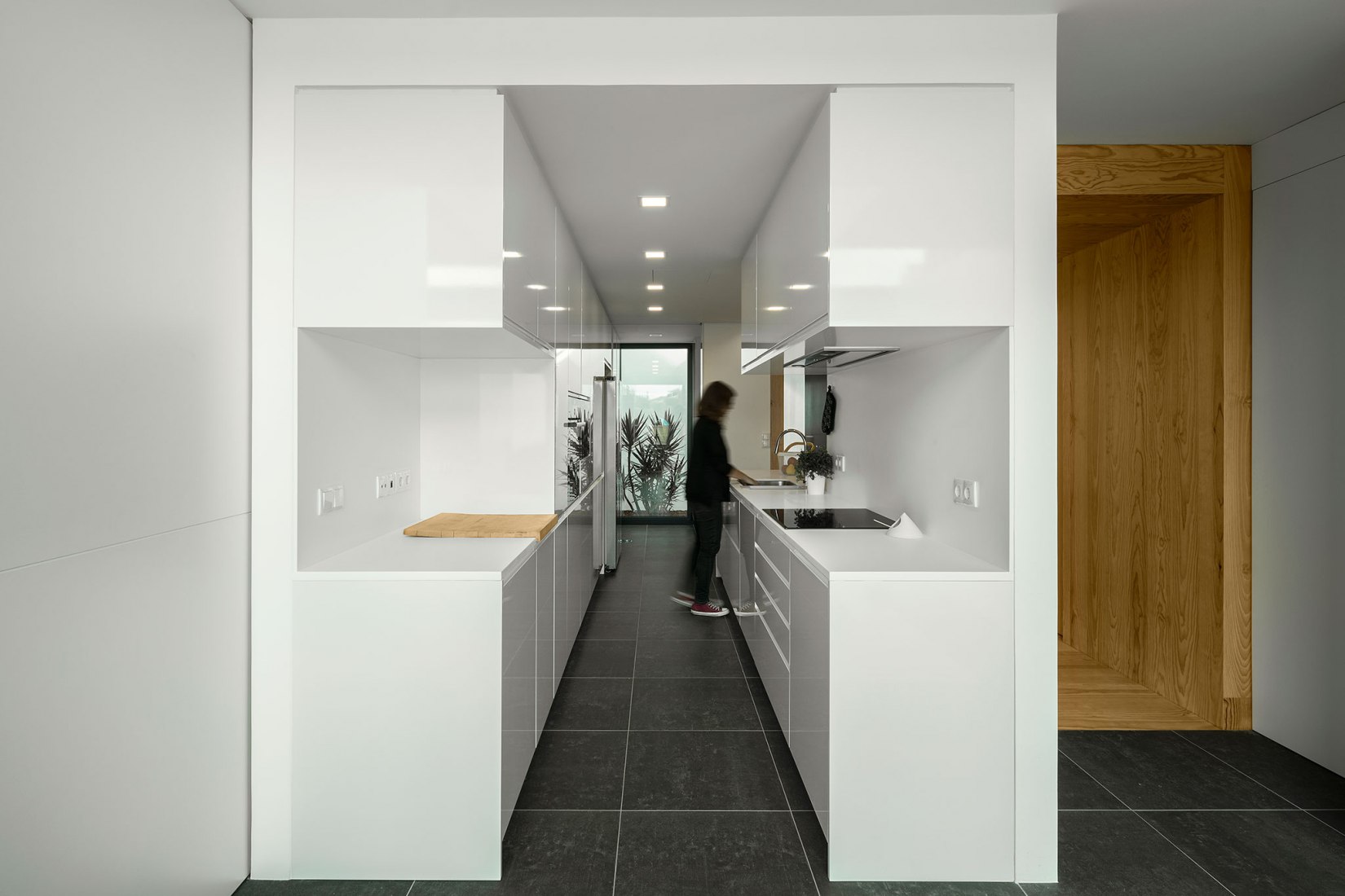 Arch House by FRARI - architecture network. Photograph by Ivo Tavares Studio.