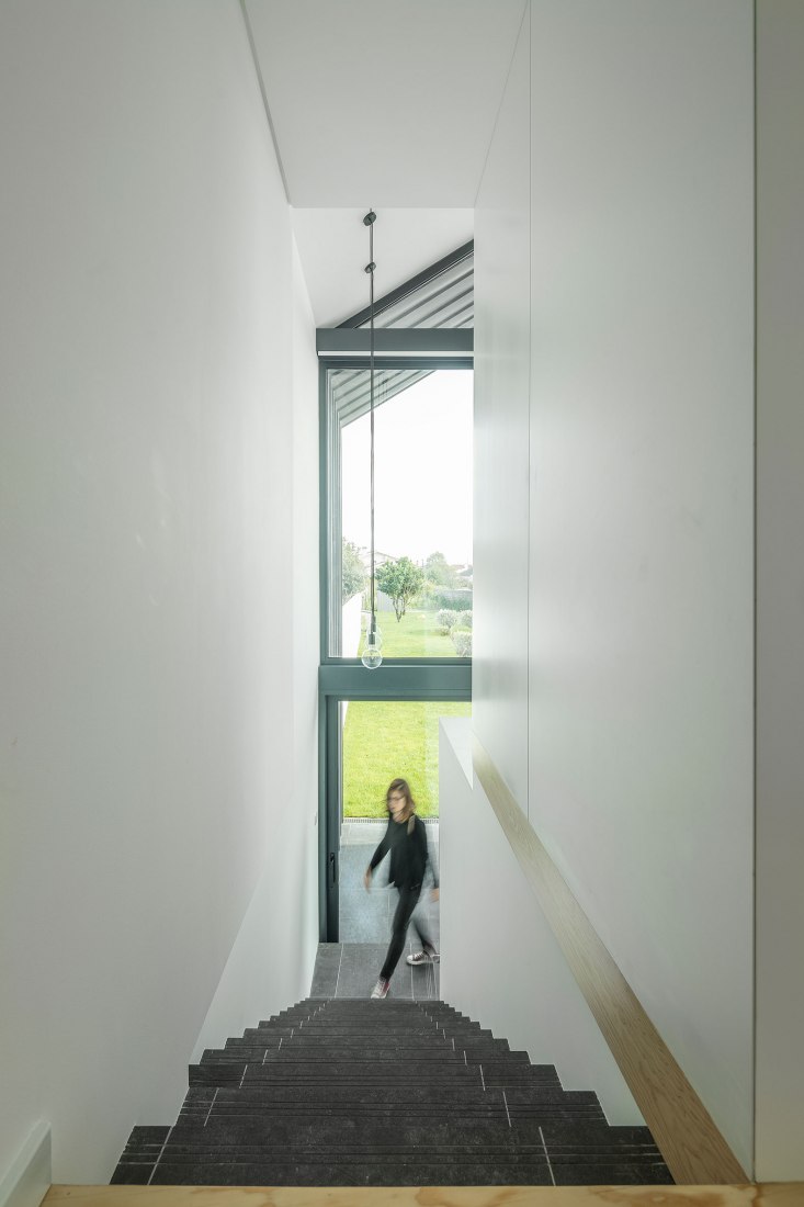 Arch House by FRARI - architecture network. Photograph by Ivo Tavares Studio.