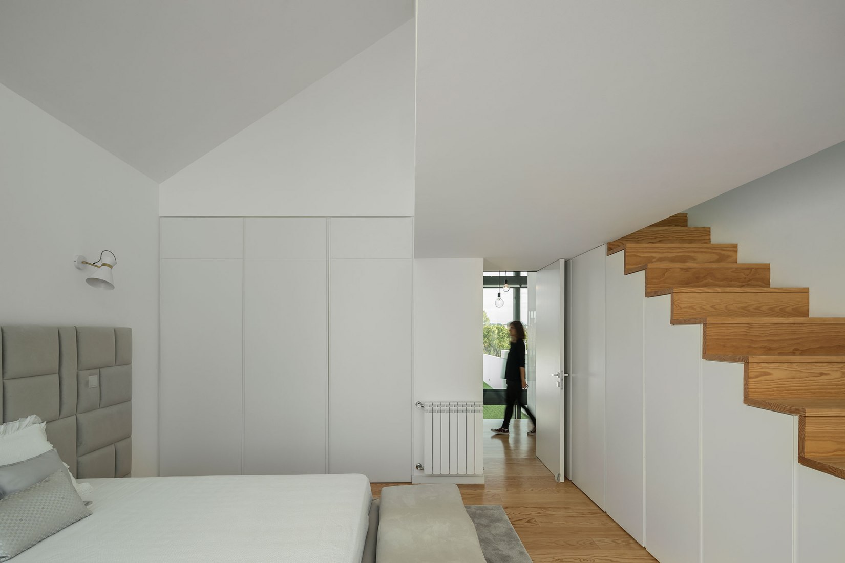Arch House by FRARI - architecture network. Photograph by Ivo Tavares Studio..