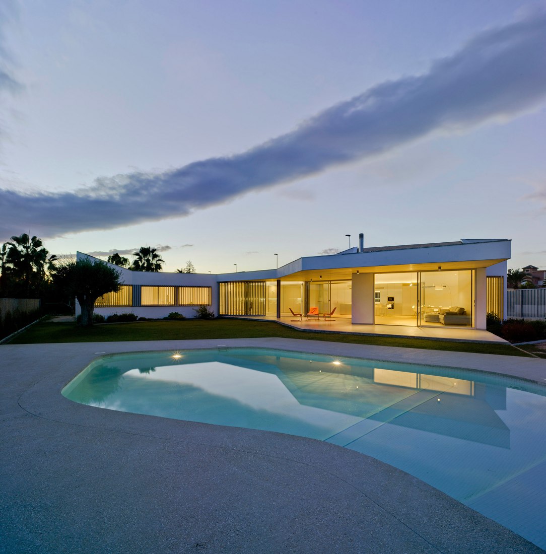Night view. Courtyard view. Matola House by Jaime Sepulcre. Photograph © David Frutos