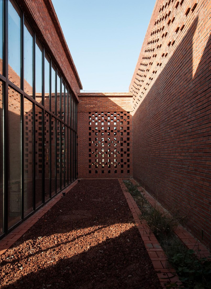 Courtyard by the restaurant. Tower of Bricks by Interval Architects. Photograph by Zhi Geng