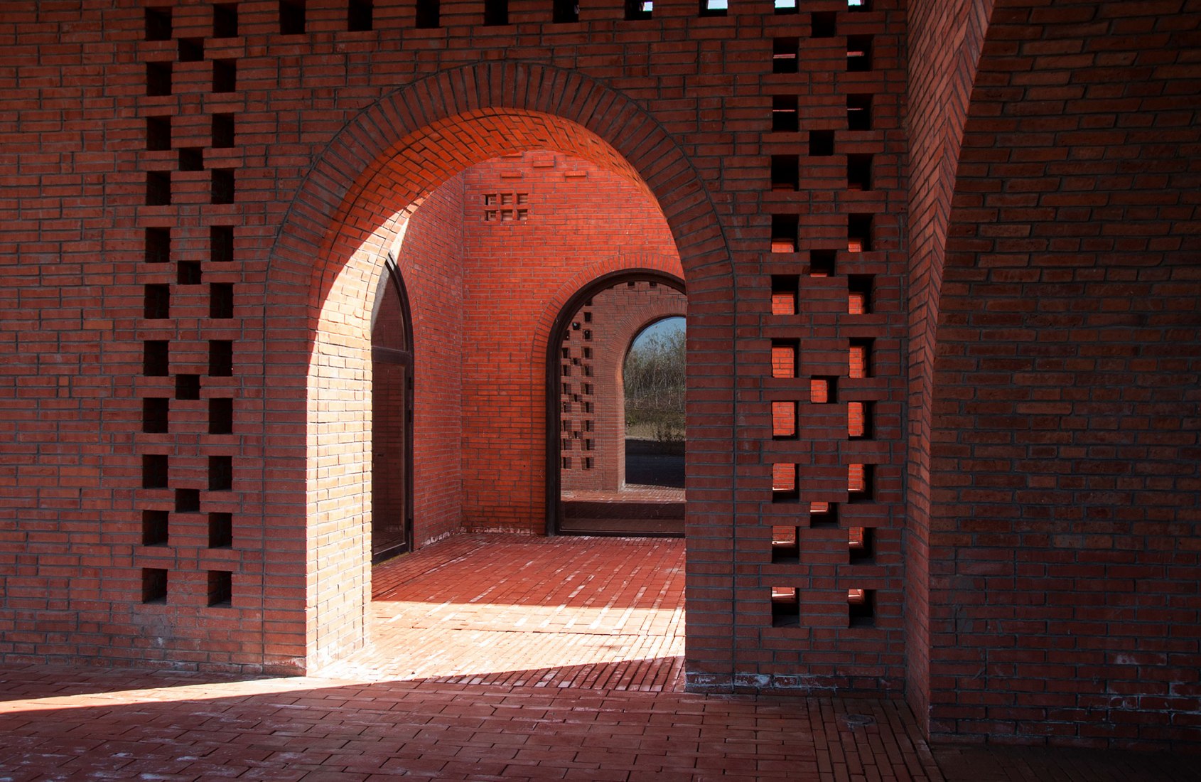 Inner courtyard entrance. Tower of Bricks by Interval Architects. Photograph by Zhi Geng