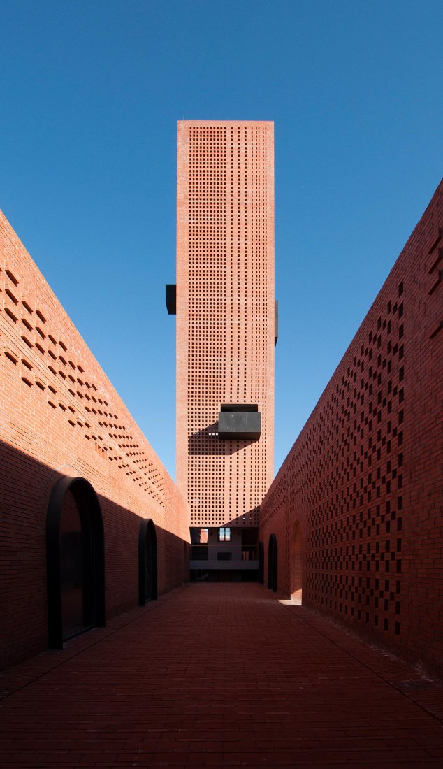 Inner courtyard overlooking tower. Tower of Bricks by Interval Architects. Photograph by Zhi Geng