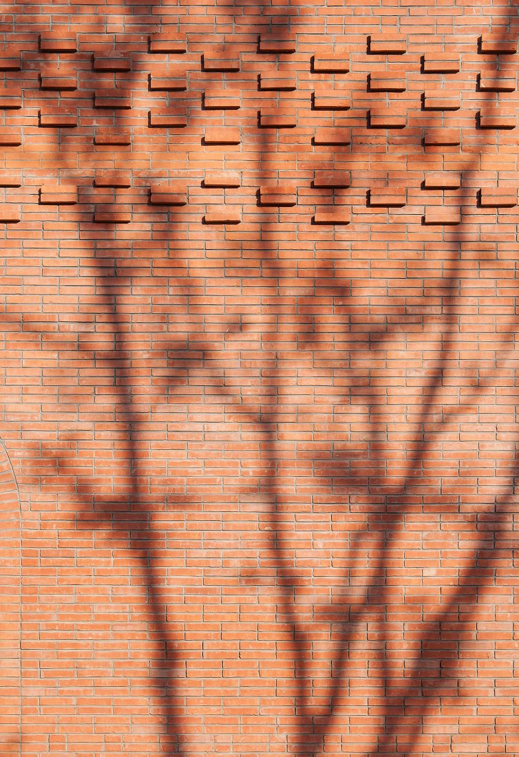Detail of brick facade. Tower of Bricks by Interval Architects. Photograph by Zhi Geng