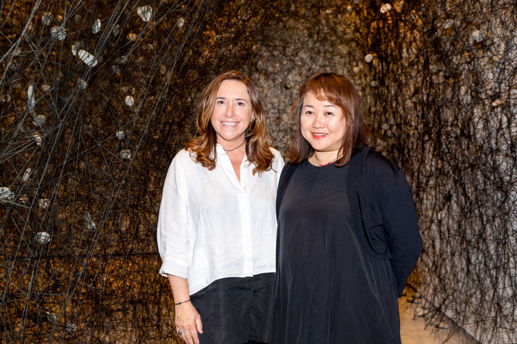Chiharu Shiota and Ana Vallés, President of Sorigué Group and Director of Sorigué Foundation. 'In the beginning was…' by Chiharu Shiota. Photography courtesy of Fundació Sorigué.