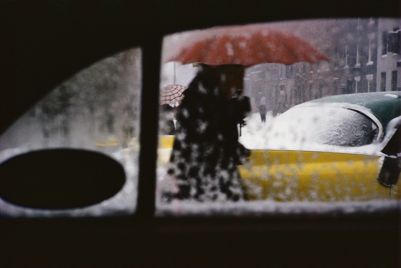 Saul Leiter, Red Umbrella, c.1955. Photograph ©Saul Leiter Foundation, Courtesy Gallery FIFTY ONE