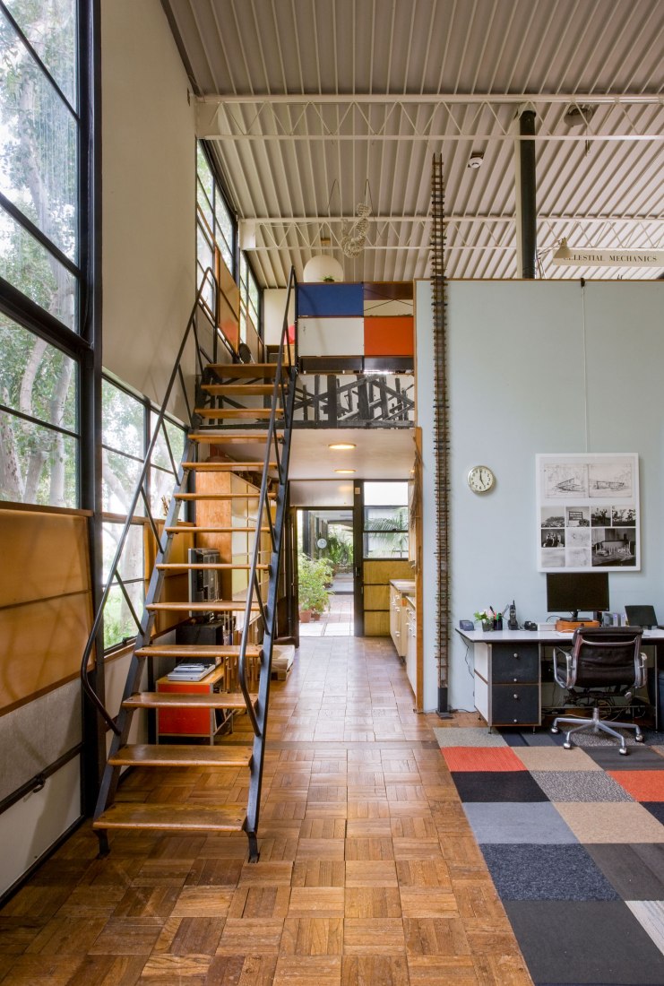 View of the studio, looking south, 2013. This provides an example of the Eameses' flexibility of design. The double-height space, which maximizes natural daylight, proved to be very adaptable and has seen many changes in use over the years. Photo: Leslie Schwartz, © Eames Office.