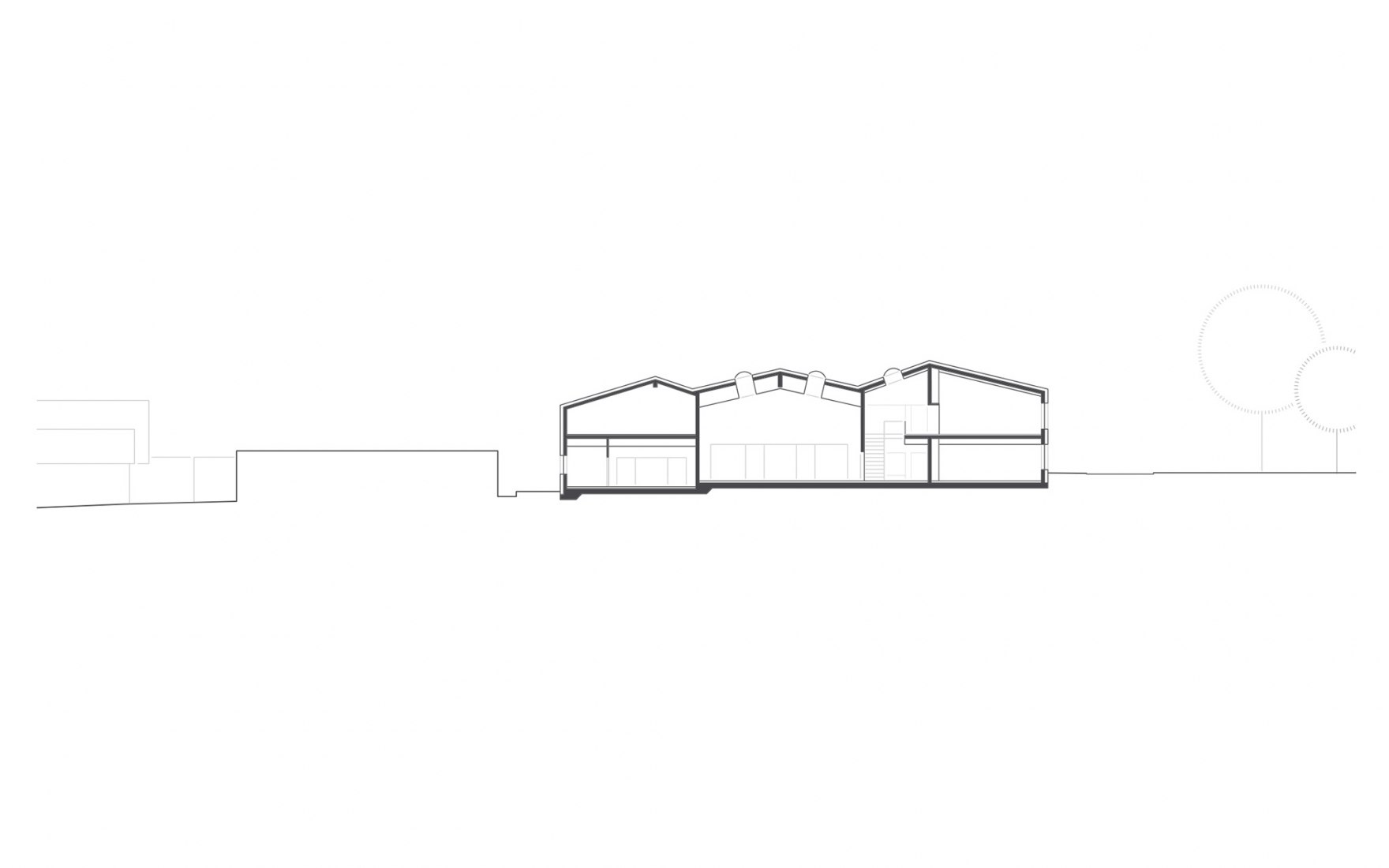 Sección. Escuela de primaria y jardín de infancia por DREI ARCHITEKTEN.