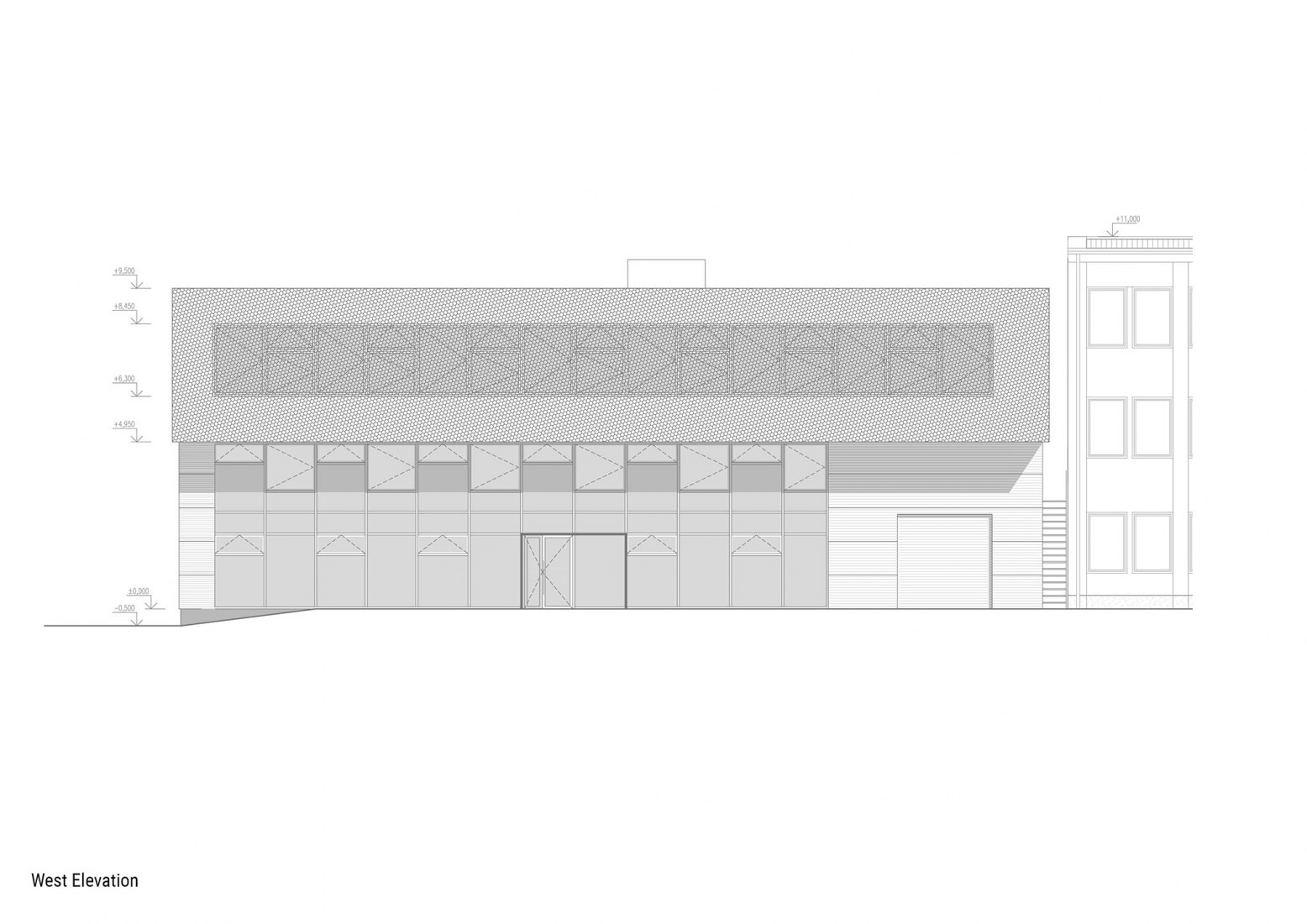 Alzado oeste. Edificio de manufacturación y administración de Pilana Karbid por Ellement architects