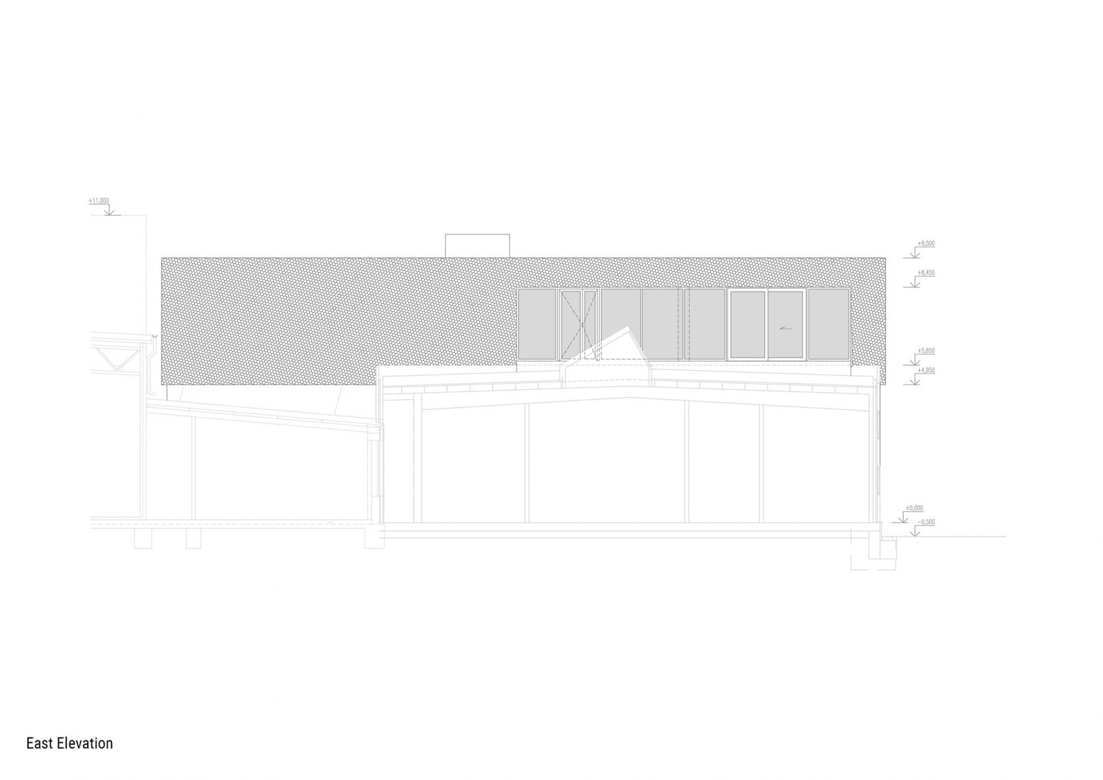 Alzado este. Edificio de manufacturación y administración de Pilana Karbid por Ellement architects