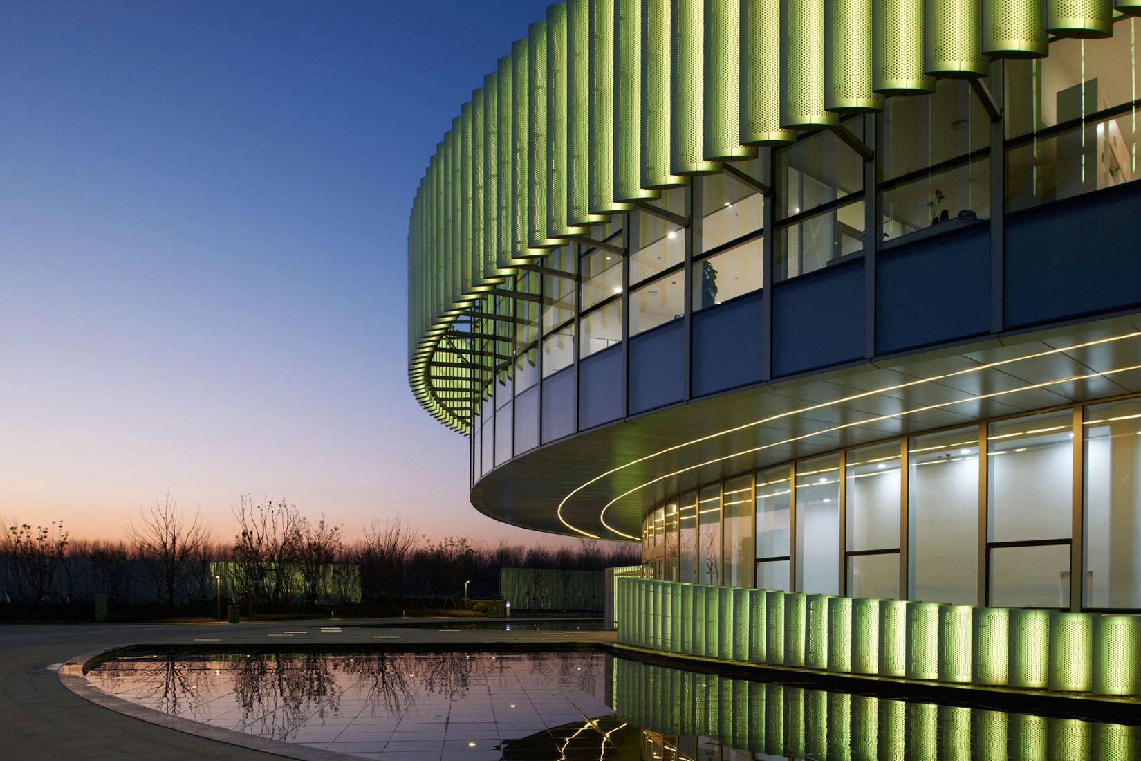 Exterior night view. Exhibition Center of Zhengzhou Linkong Biopharmaceutical Park by WSP ARCHITECTS. Photography by RUIJING Photography