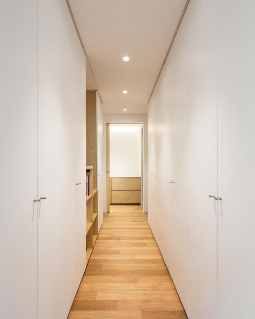 Closet, third floor level. Five story house by stpmj. Photograph by Bae Jihun