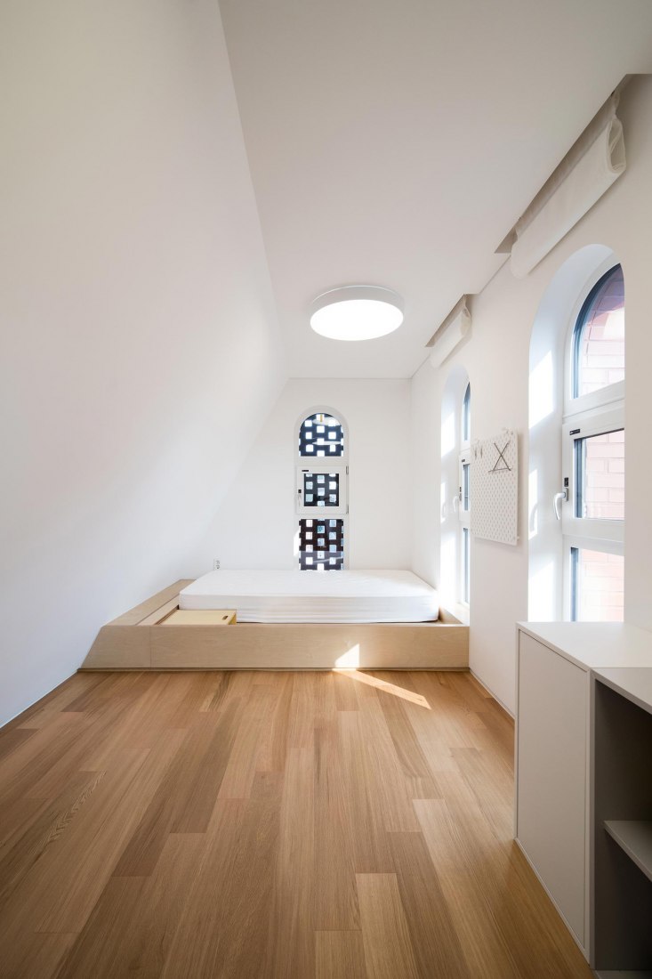 Bedroom, Fifth floor level. Five story house by stpmj. Photograph by Bae Jihun
