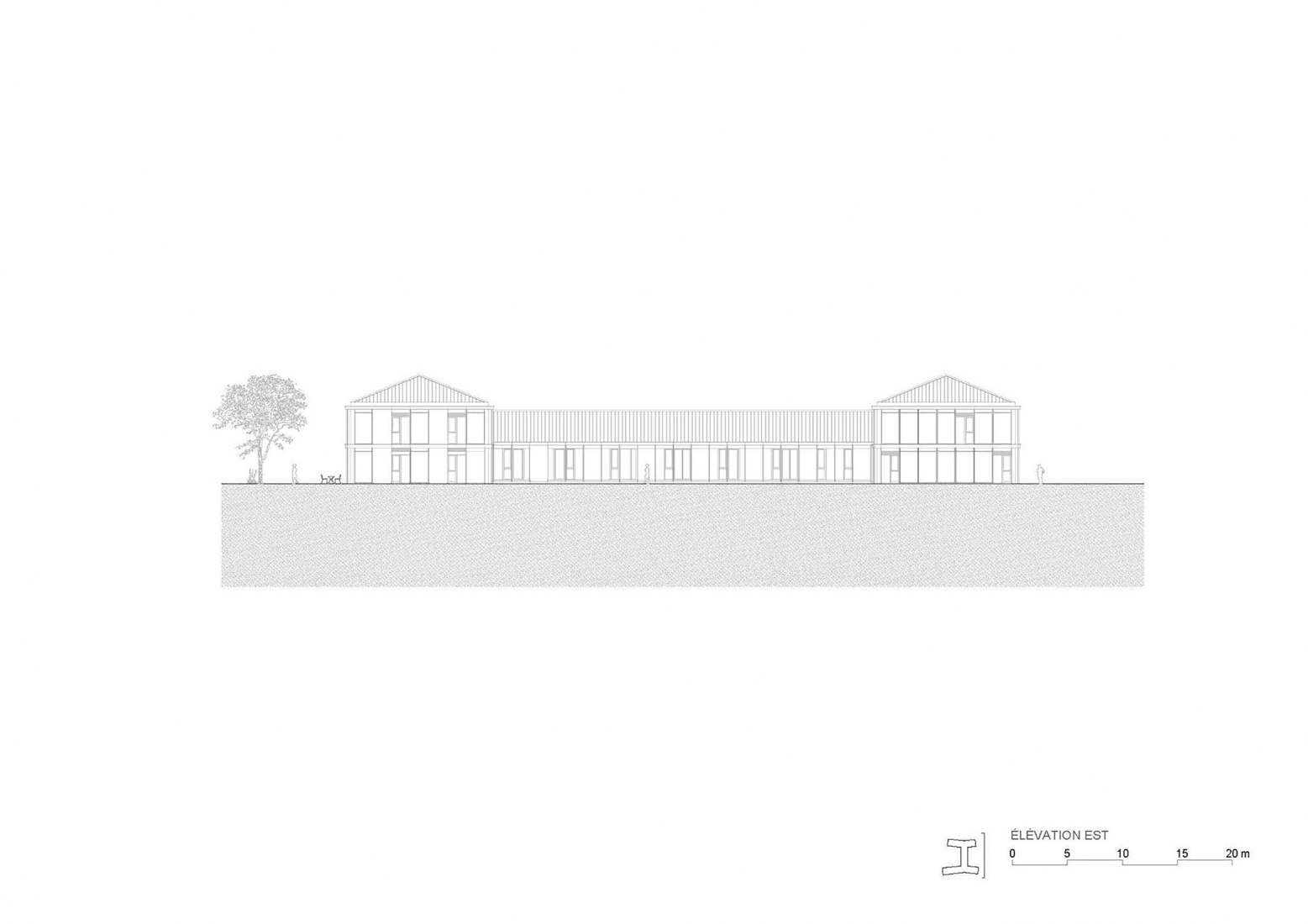 Alzado Este. Talleres socioeducativos para personas con discapacidad de la Fundación l'Espérance por FWG Architects.