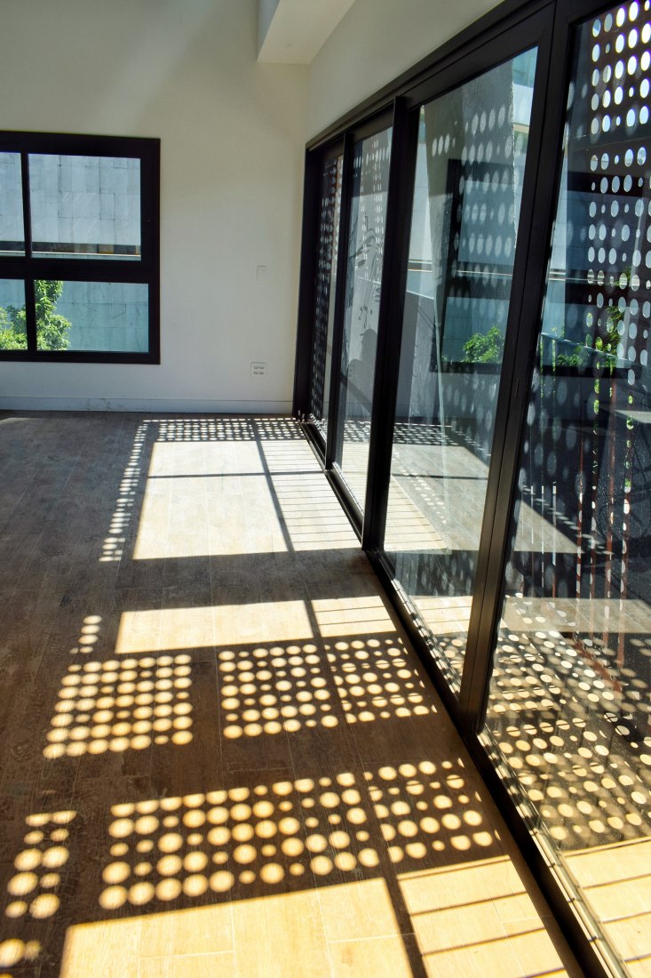 Casamirador Savassi por Gisele Borges Arquitetura. Fotografía por Leon Myssior