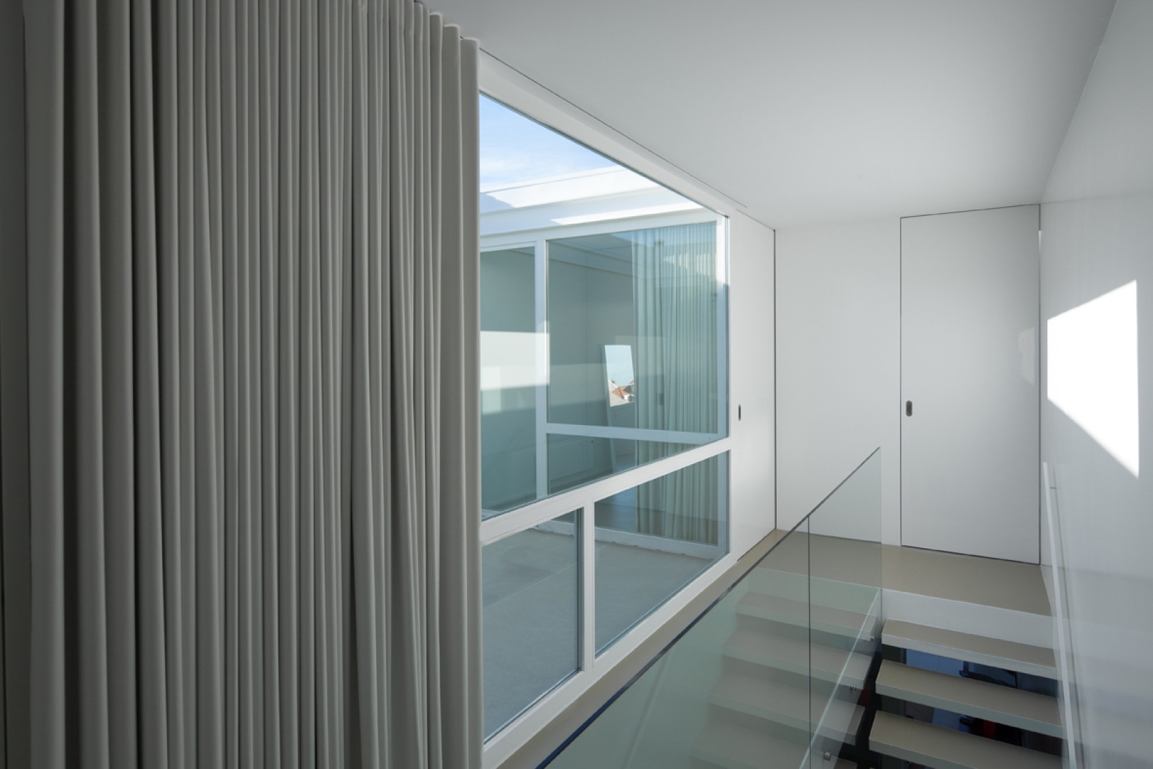 Stairs. Urban House in Lindo Vale by Ana Cláudia Monteiro + Vítor Oliveira. Photography © José Campos.