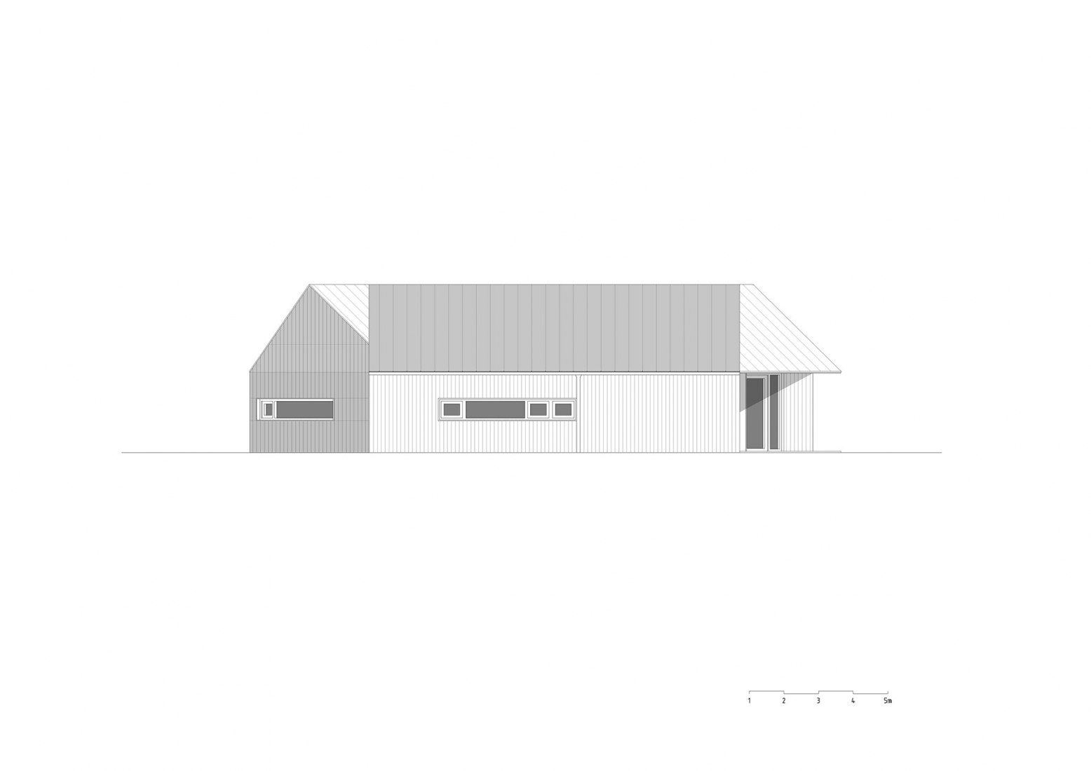 West elevation of House with In-law Suite por KLAR.