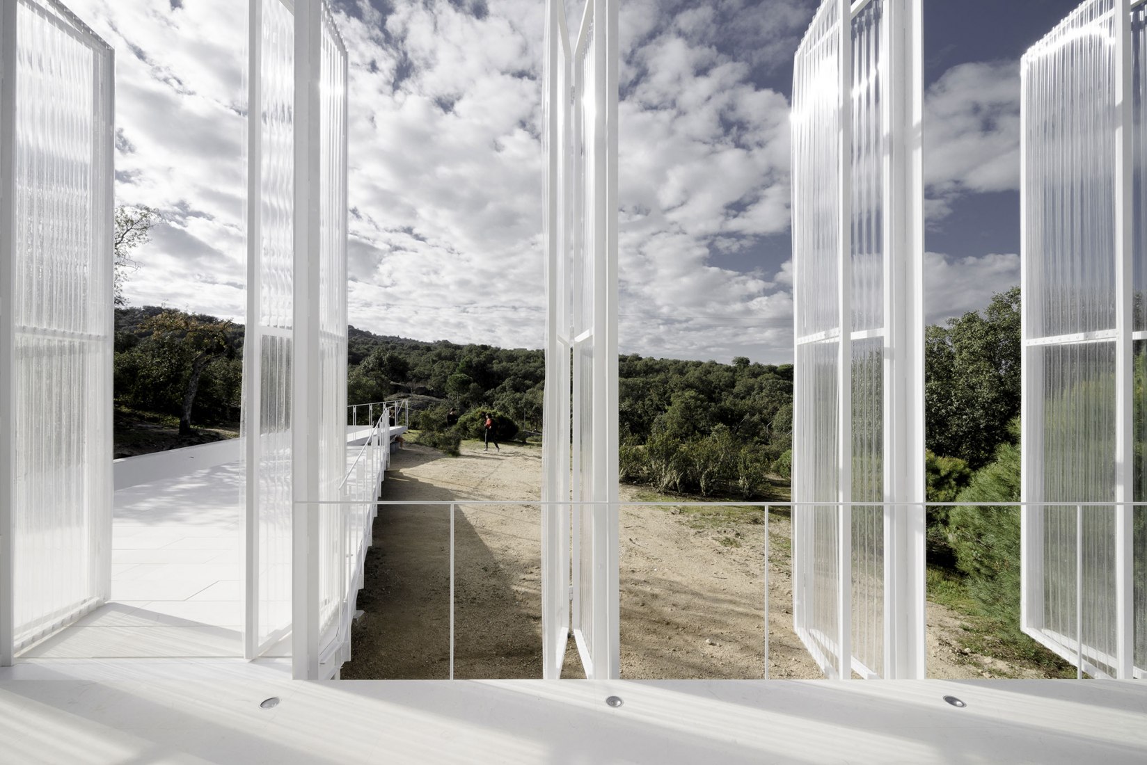 House and painting space for an artist by Idearch. Photograph by Joaquín Mosquera