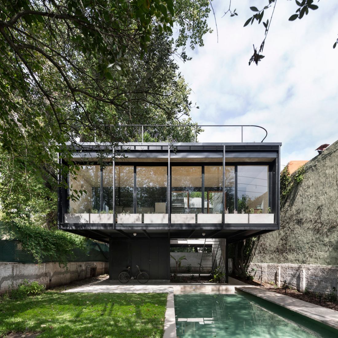 Dilute the boundaries to be permeable to the environment. ATO House by